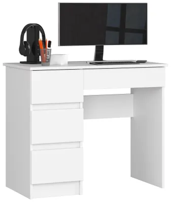 A white desk with a computer monitor, headphones, and office supplies.