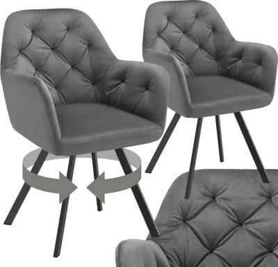 Two grey velvet armchairs are shown, one in the foreground and one in the background. The armchair in the foreground has arrows indicating it can swivel.