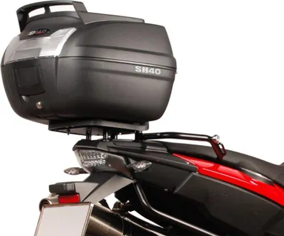 A close-up rear view of a motorcycle's top case and tail section.