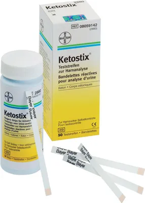 A bottle of Bayer Ketostix test strips and its packaging are shown against a white background.