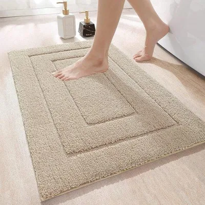Produktbild von Unyqoos® Badematte aus Mikrofaser – rutschfester Dusch- & Badvorleger, saugfähig, maschinenwaschbar, Beige, 50 x 80 cm