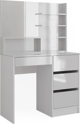 A white vanity desk with a mirror and shelves.