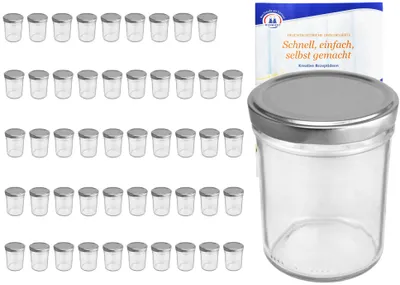 A collection of small glass jars with silver lids, alongside a single larger jar and a booklet.