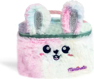 A close-up of a fluffy, rainbow-colored cosmetic bag with bunny ears.