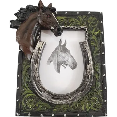 A decorative picture frame with a horse head and horseshoe motif.