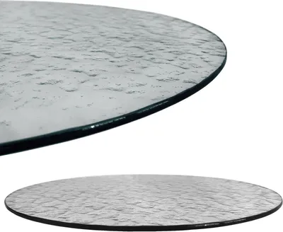 A close-up view of a round glass tabletop with a textured surface, shown from two different angles against a white background.