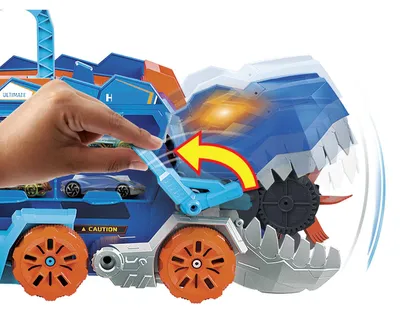 Produktbild von Hot Wheels City Ultimativer T-Rex Transporter