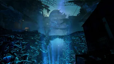 A dark, atmospheric scene with glowing blue elements and a large, spherical structure in the background.