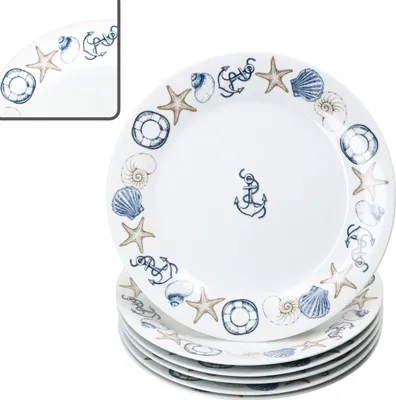 A stack of dinner plates with a nautical theme.