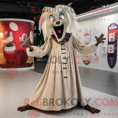 Produktbild von Maskottchen REDBROKOLY eines braungebrannten Vampirs mit Maxikleid und Haarspangen