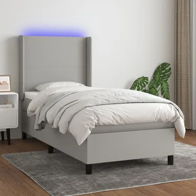 Imagen del producto de Cama con somier y colchón Living Store, color gris claro, 90x190 cm, tapizada en tela