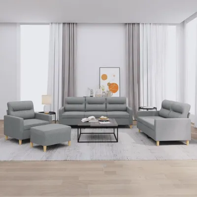 A living room scene with a sofa set and a coffee table.
