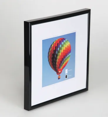 A framed picture of a hot air balloon.