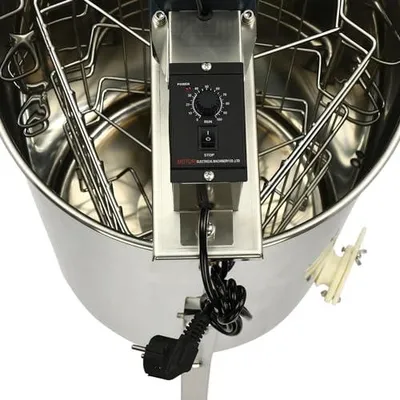 Image de Extracteur de miel électrique pour 3 cadres, idéal pour les apiculteurs professionnels et amateurs. Fabriqué en acier inoxydable de qualité alimentaire. Équipement professionnel pour l'extraction du miel