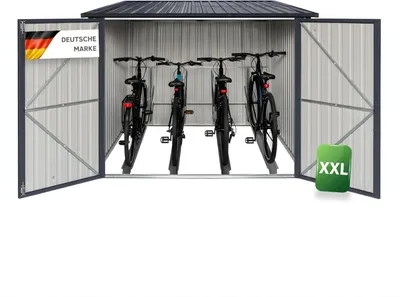 A metal bicycle garage with four bicycles stored inside, shown with its doors open.