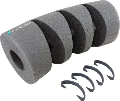 A product shot of pipe insulation and clips on a white background.