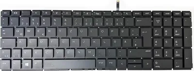 A black laptop keyboard with a ribbon cable attached.