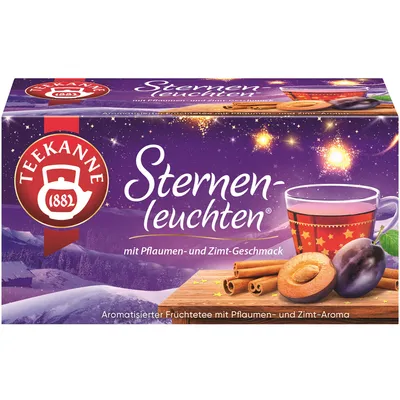 A box of Teekanne Sternenleuchten fruit tea with plums and cinnamon flavor, set against a starry night sky and snowy landscape.