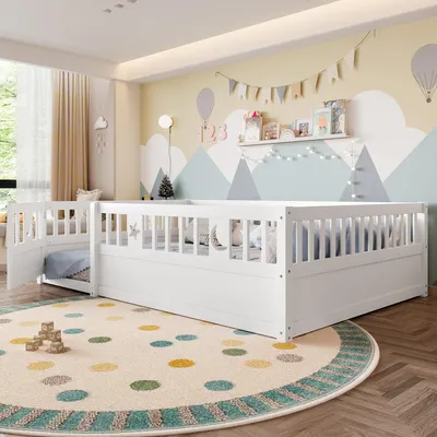 A child's bedroom with a white bed and colorful decor.