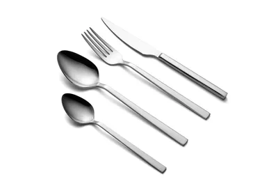 A set of four stainless steel cutlery items arranged diagonally on a white background.