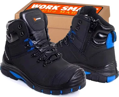 A pair of black work boots with blue accents, shown in front of a cardboard box.