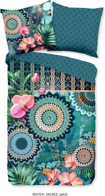 A flat lay of a duvet cover and pillowcases with a floral and mandala pattern.
