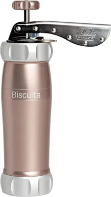 A rose gold and silver cookie press.