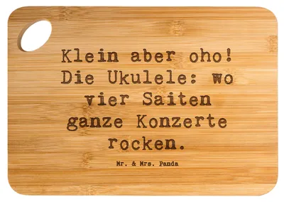 Produktbild von Mr. & Mrs. Panda Frühstücksbrettchen Spruch Ukulele Magie - Transparent - Geschenk, Küchenbrett, Musikinstrument, Frühstücksbrett, Konzerte, Holzbrett, Musiker, Brett