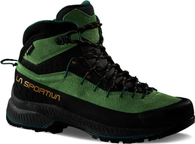 Grüner La Sportiva TX4 Evo Mid Woman GTX Schuh mit schwarzer Sohle und gelber Markenaufschrift