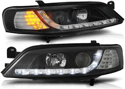 Produktbild von Scheinwerfer LED Tagfahrlicht Optik passend für Opel Vectra B 95-98 Schwarz LED Blinker