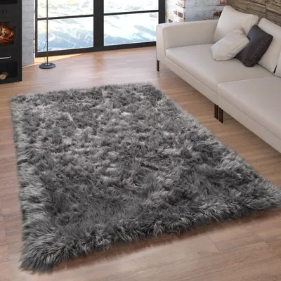 Produktbild von Kunstfell Fellteppich Imitat Sitzkissen Herzform Rund Versch. Formen Dunkelgrau Grösse 40x60 cm