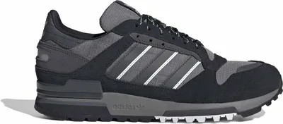 A side view of an Adidas sneaker.