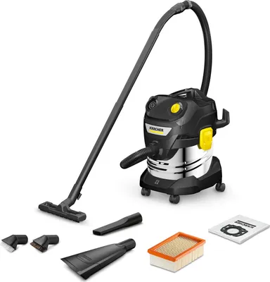 A Kärcher wet and dry vacuum cleaner with various accessories laid out around it.