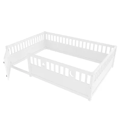 A white children's bed frame with a drop-down door and decorative cutouts of a star and moon.