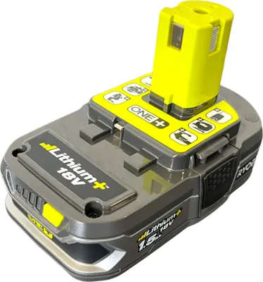 A Ryobi 18V Lithium+ battery pack with a charger and two 1.5 Ah batteries.