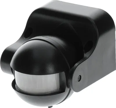 A black motion detector with a dome-shaped sensor.