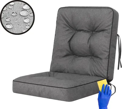 A grey chair cushion is shown on a white background. A small circular inset shows water droplets on fabric, and a gloved hand is cleaning the cushion with a yellow sponge.
