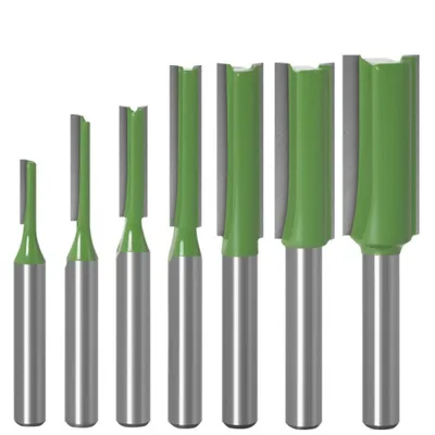 A set of six router bits with green handles and silver shafts, arranged in a row against a white background.