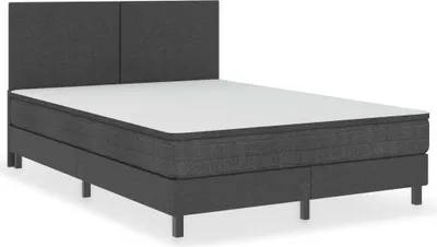 A bed with a mattress and headboard on a white background.