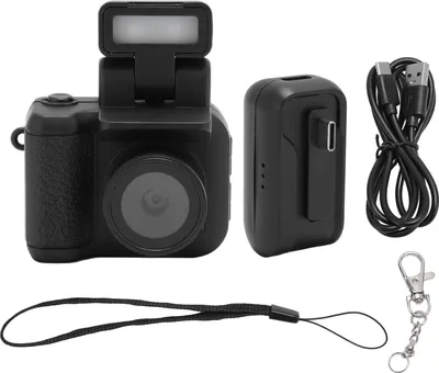 A collection of small digital camera accessories laid out on a white background.