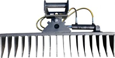 A heavy-duty rake attachment for a mini excavator, designed for root removal.
