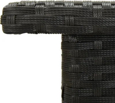 A close-up view of the woven texture of a black side table.