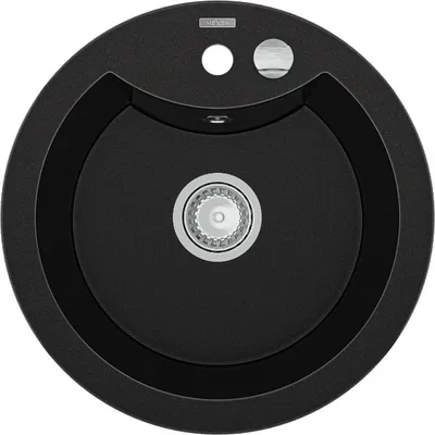 A top-down view of a black granite kitchen sink with a drain and faucet hole.