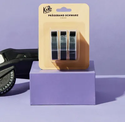 Produktbild von KoRo | Schwarzes Prägeband für Beschriftungsgerät 9 mm x 3 m