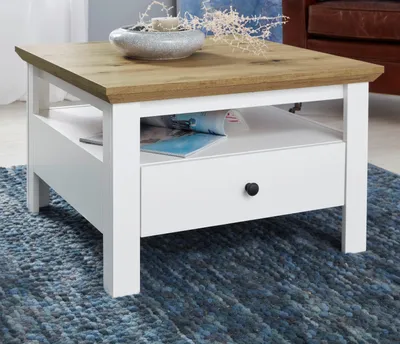 A coffee table in a living room setting.
