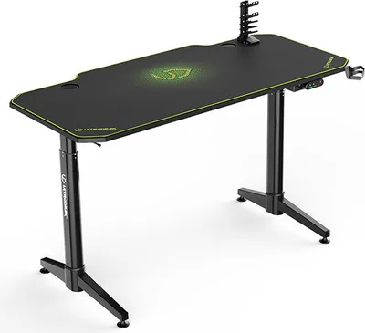 A black gaming desk with green accents and a green logo on a white background.