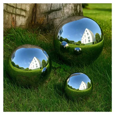 Produktbild von Set aus 3 polierten Gartenkugeln aus hochwertigem Edelstahl in 10, 15 und 20 cm
