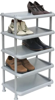 A multi-tiered shoe rack with various types of shoes on each shelf.