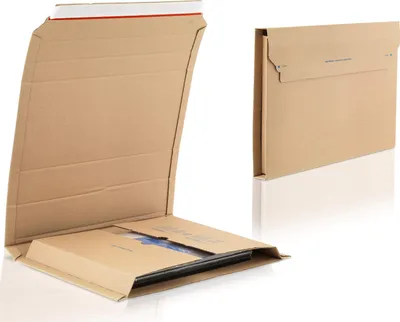 Two cardboard book packaging boxes are shown against a white background. One is open, revealing a flat item inside, and the other is closed.