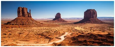 Produktbild von Wallario Wandbild aus Acryl, 200 x 80 cm, freischwebende Optik - Monument Valley unter blauem Himmel